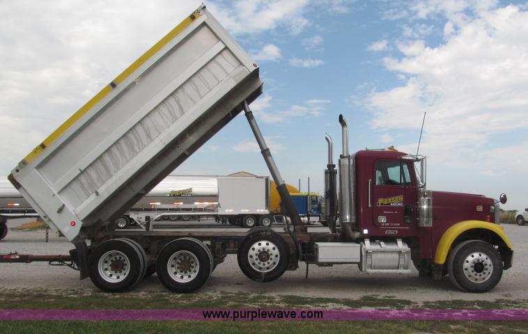 image for item F7111 2000 Freightliner FLD120SD tri axle dump truck
