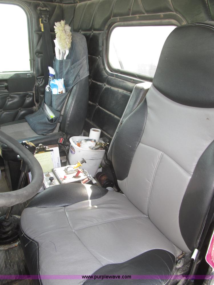 image for item F7111 2000 Freightliner FLD120SD tri axle dump truck