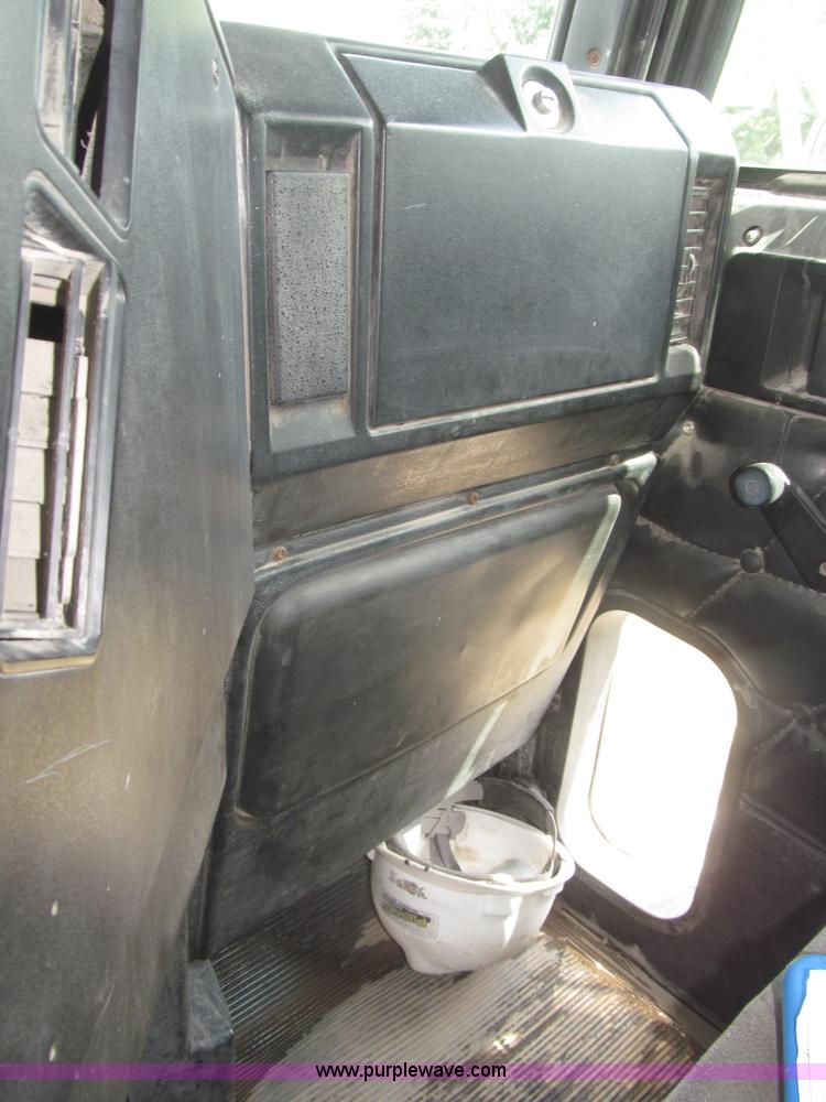 image for item F7111 2000 Freightliner FLD120SD tri axle dump truck