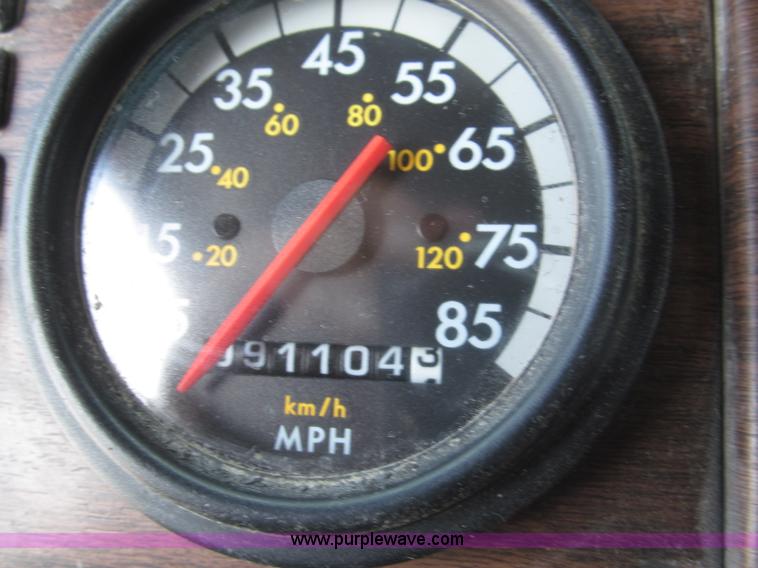 image for item F7111 2000 Freightliner FLD120SD tri axle dump truck