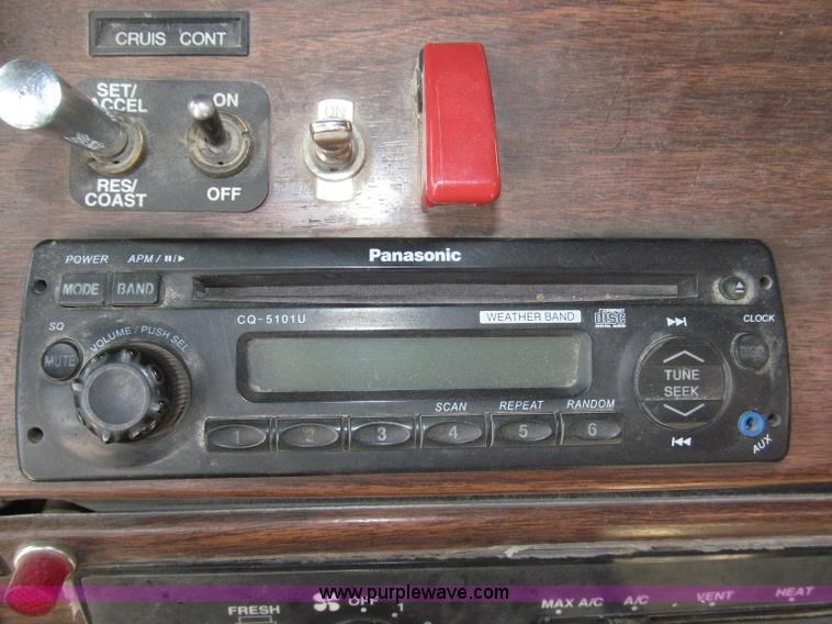 image for item F7111 2000 Freightliner FLD120SD tri axle dump truck