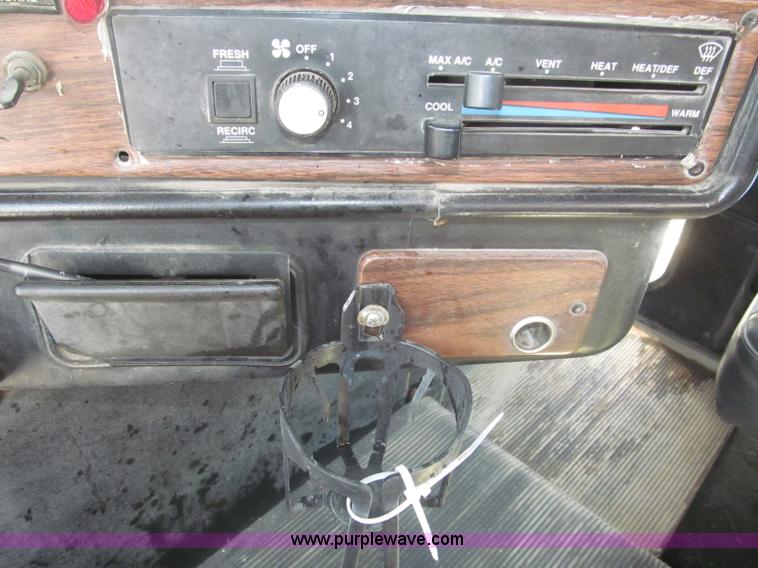 image for item F7111 2000 Freightliner FLD120SD tri axle dump truck