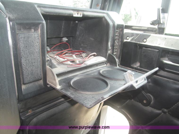 image for item F7111 2000 Freightliner FLD120SD tri axle dump truck