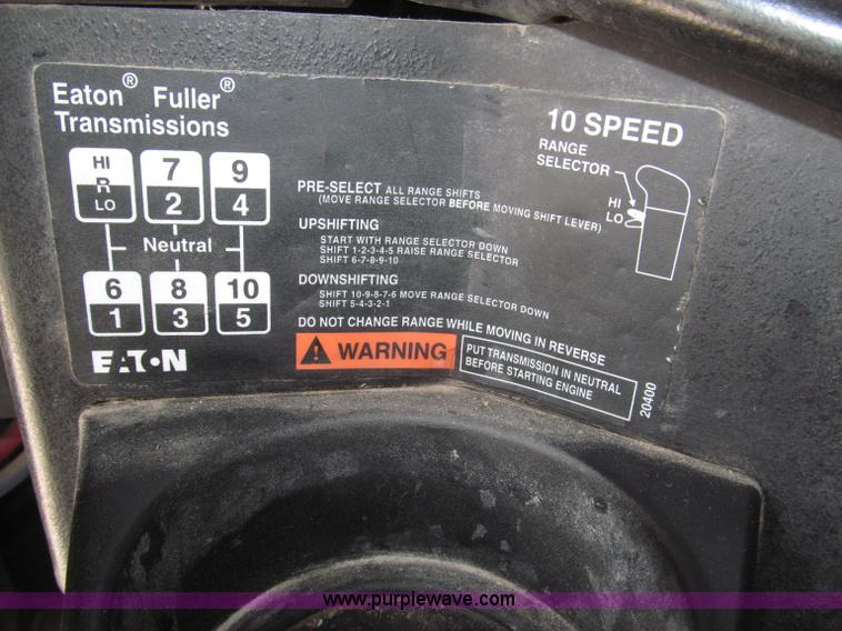 image for item F7111 2000 Freightliner FLD120SD tri axle dump truck