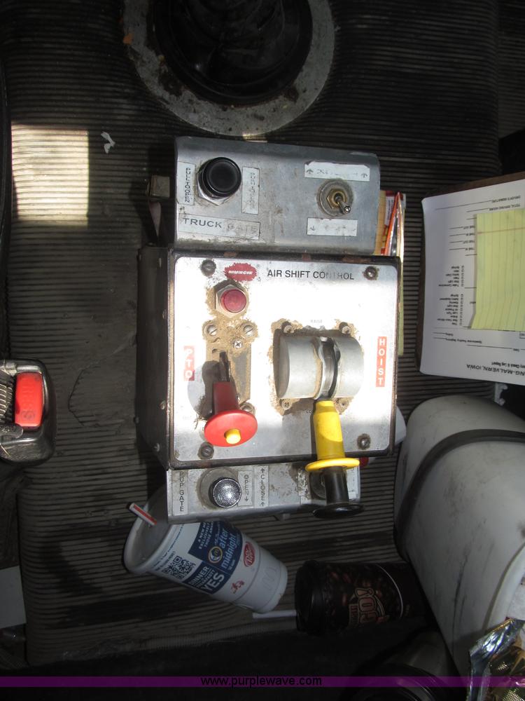 image for item F7111 2000 Freightliner FLD120SD tri axle dump truck