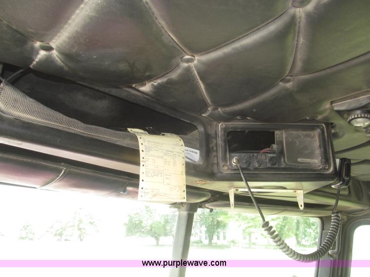 image for item F7111 2000 Freightliner FLD120SD tri axle dump truck