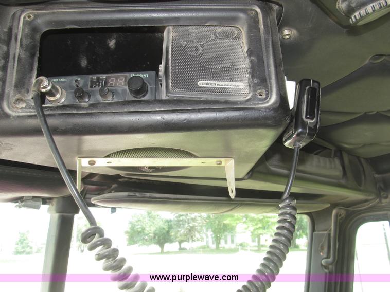 image for item F7111 2000 Freightliner FLD120SD tri axle dump truck