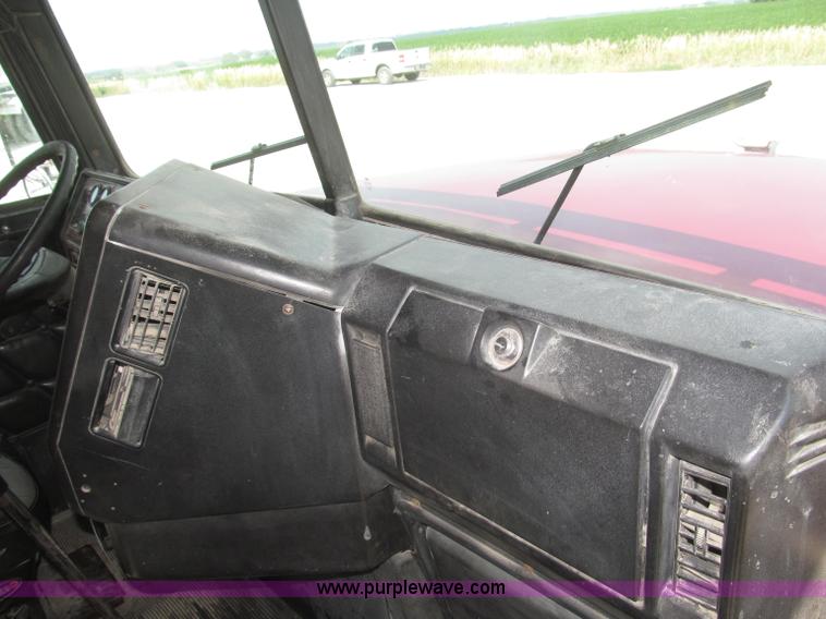 image for item F7111 2000 Freightliner FLD120SD tri axle dump truck