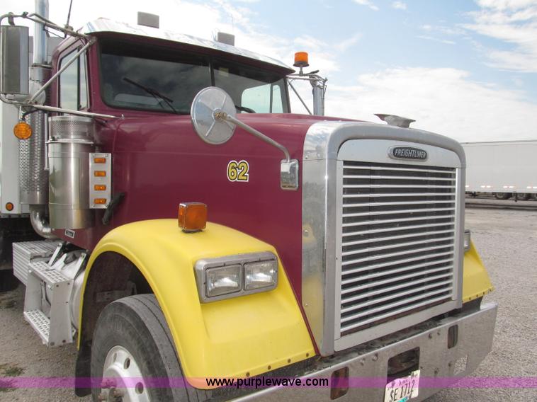image for item F7111 2000 Freightliner FLD120SD tri axle dump truck