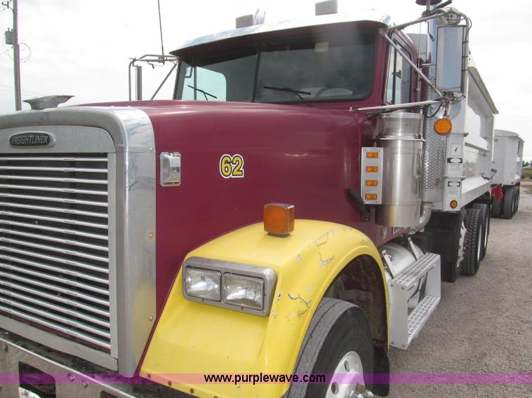 image for item F7111 2000 Freightliner FLD120SD tri axle dump truck
