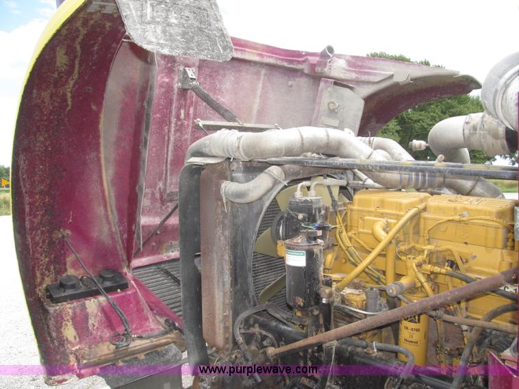 image for item F7111 2000 Freightliner FLD120SD tri axle dump truck