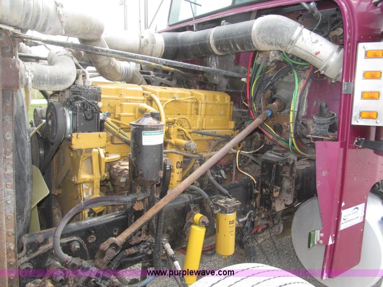 image for item F7111 2000 Freightliner FLD120SD tri axle dump truck