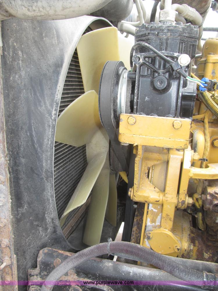 image for item F7111 2000 Freightliner FLD120SD tri axle dump truck