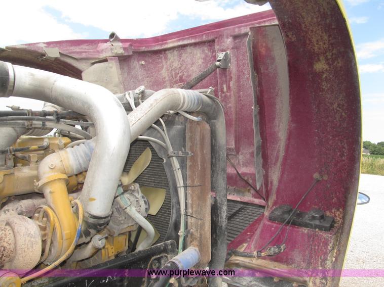 image for item F7111 2000 Freightliner FLD120SD tri axle dump truck