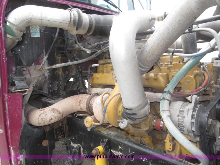 image for item F7111 2000 Freightliner FLD120SD tri axle dump truck