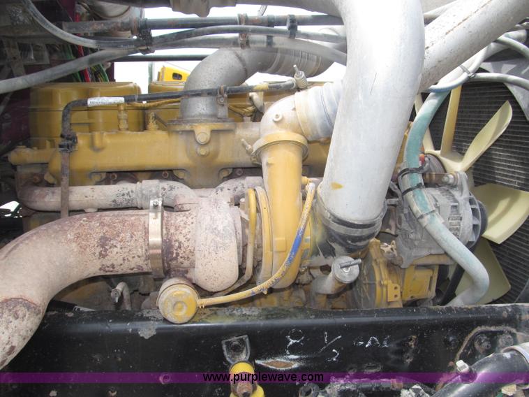 image for item F7111 2000 Freightliner FLD120SD tri axle dump truck