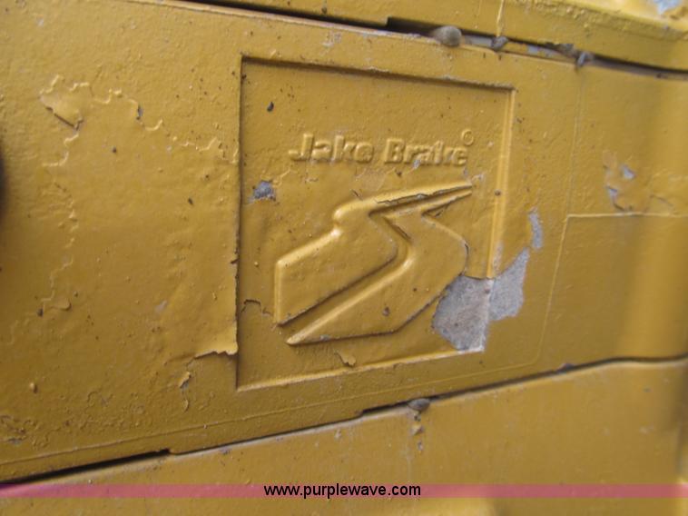 image for item F7111 2000 Freightliner FLD120SD tri axle dump truck