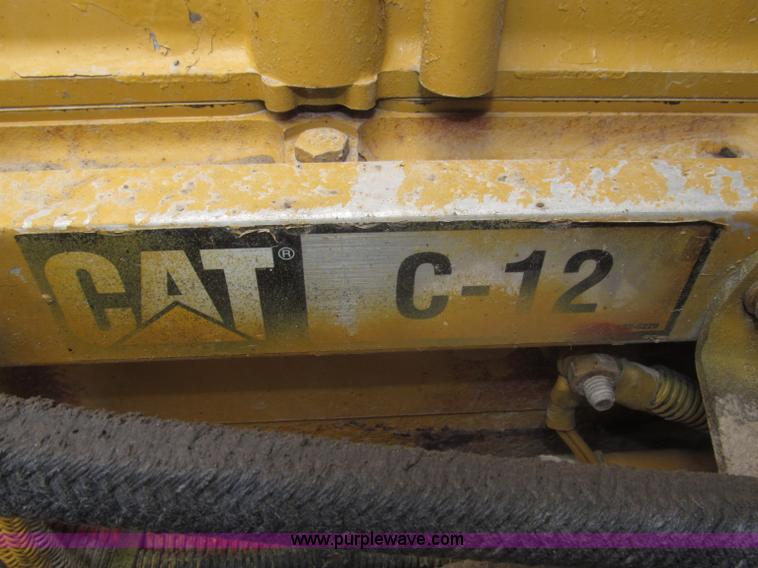 image for item F7111 2000 Freightliner FLD120SD tri axle dump truck