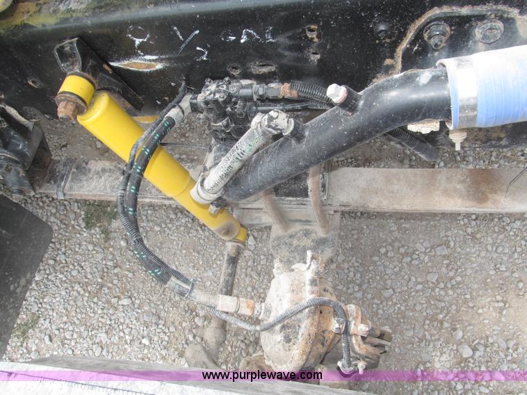 image for item F7111 2000 Freightliner FLD120SD tri axle dump truck