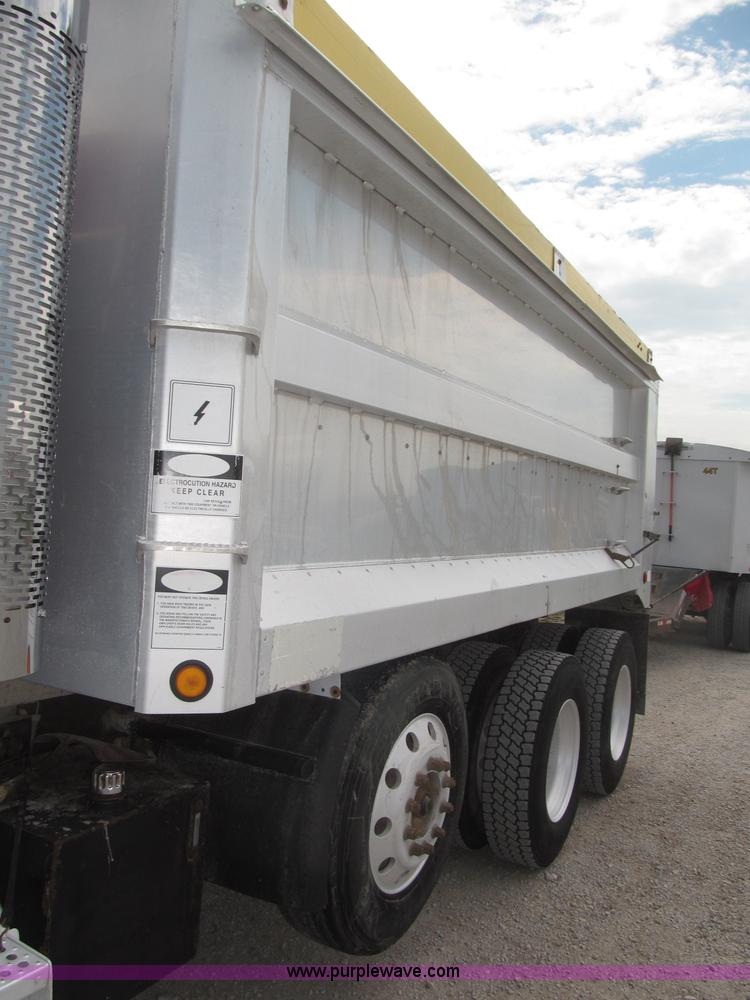 image for item F7111 2000 Freightliner FLD120SD tri axle dump truck