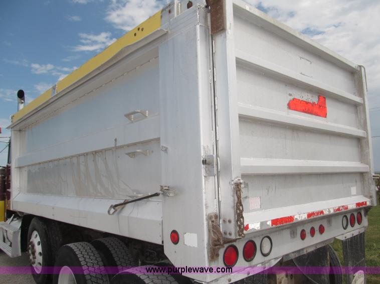 image for item F7111 2000 Freightliner FLD120SD tri axle dump truck