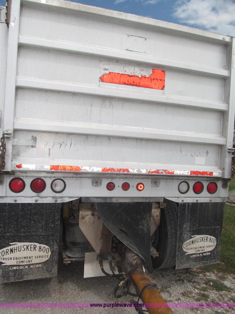 image for item F7111 2000 Freightliner FLD120SD tri axle dump truck