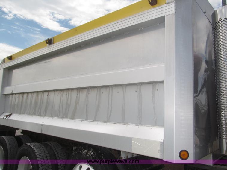 image for item F7111 2000 Freightliner FLD120SD tri axle dump truck