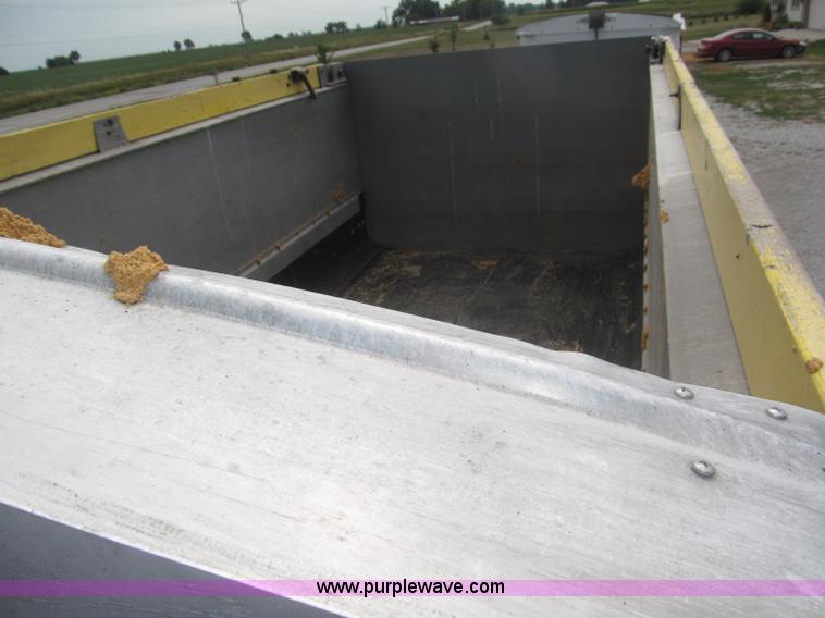 image for item F7111 2000 Freightliner FLD120SD tri axle dump truck