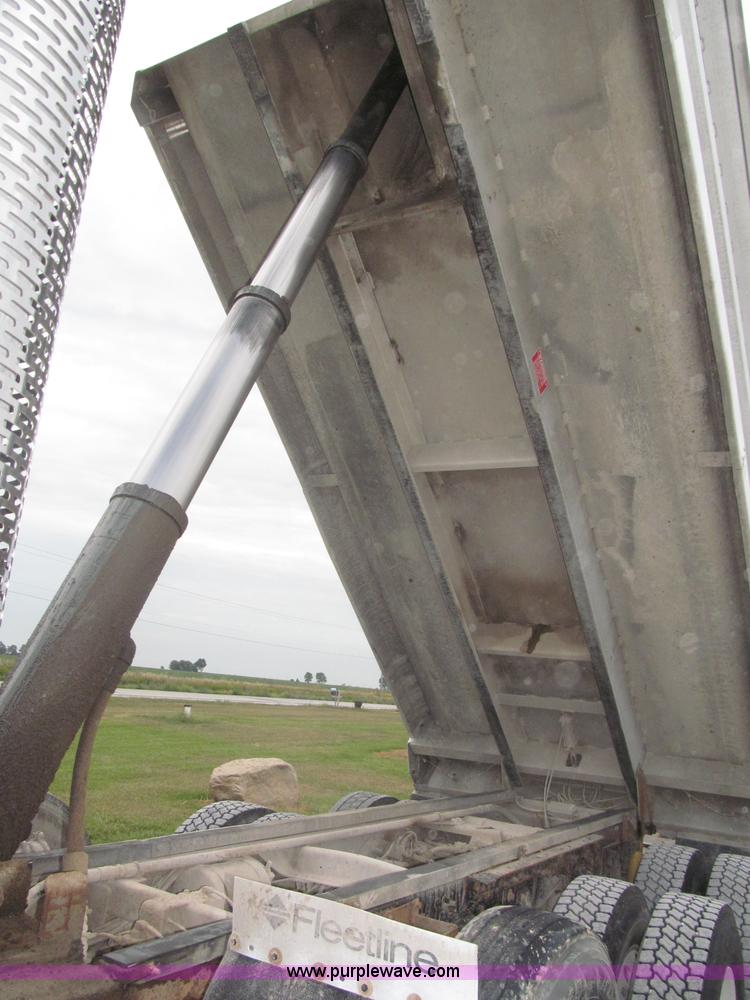 image for item F7111 2000 Freightliner FLD120SD tri axle dump truck