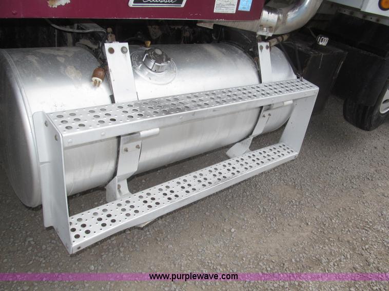 image for item F7111 2000 Freightliner FLD120SD tri axle dump truck