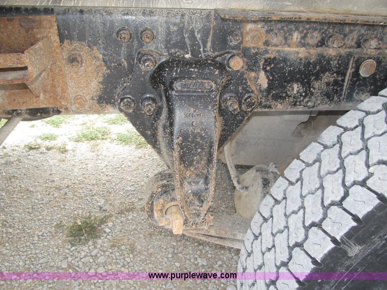 image for item F7111 2000 Freightliner FLD120SD tri axle dump truck