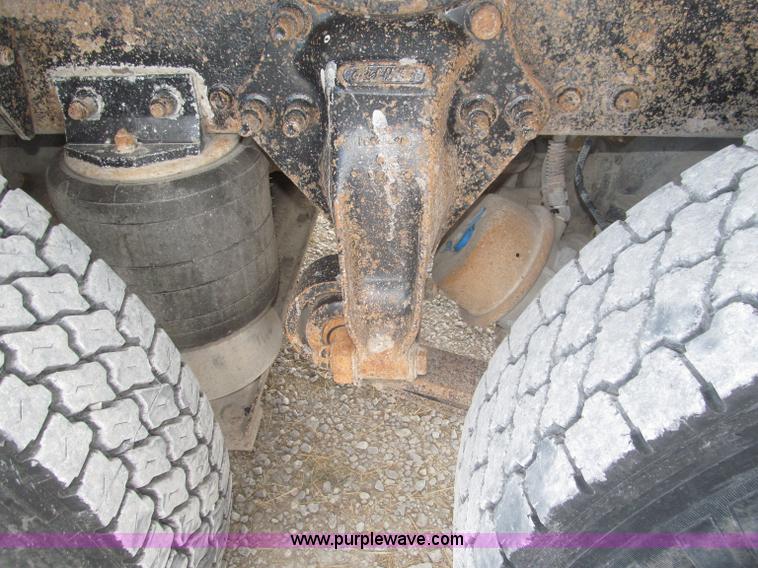 image for item F7111 2000 Freightliner FLD120SD tri axle dump truck