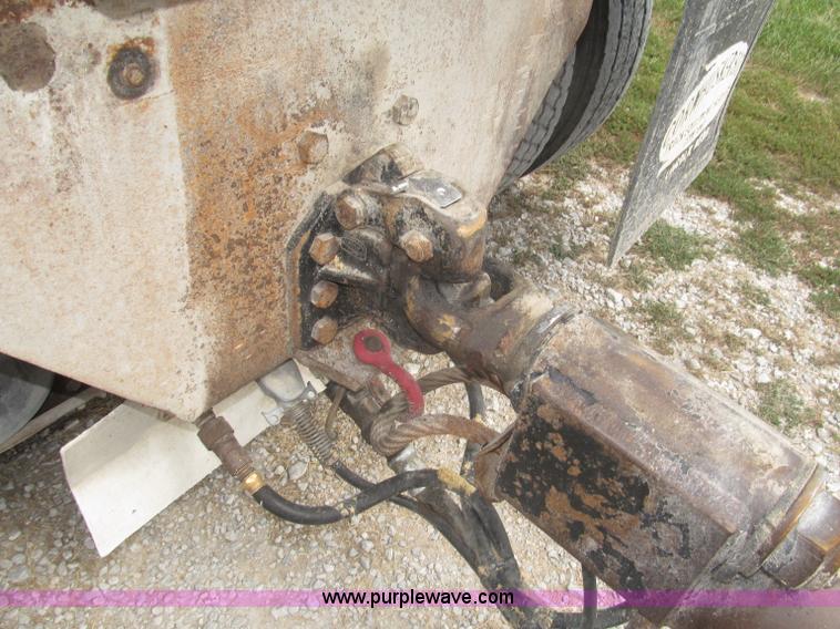 image for item F7111 2000 Freightliner FLD120SD tri axle dump truck