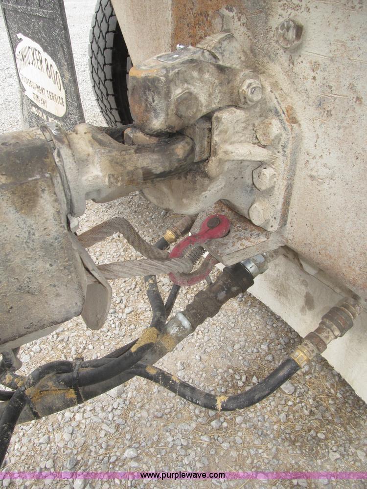 image for item F7111 2000 Freightliner FLD120SD tri axle dump truck