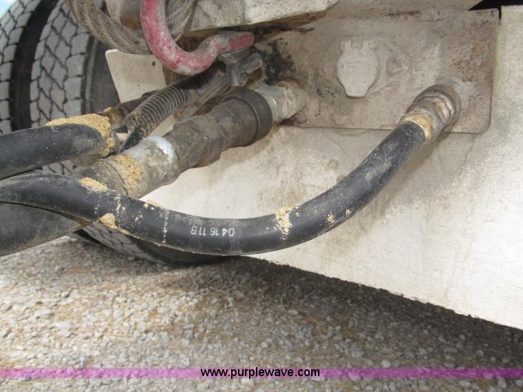 image for item F7111 2000 Freightliner FLD120SD tri axle dump truck