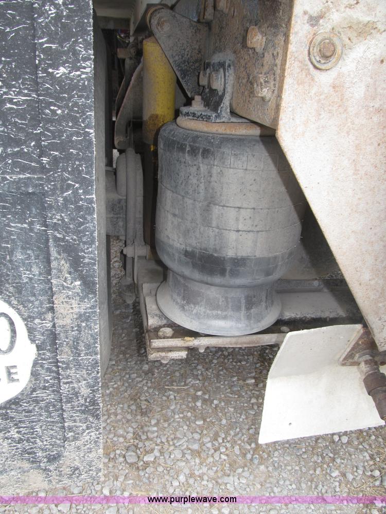 image for item F7111 2000 Freightliner FLD120SD tri axle dump truck