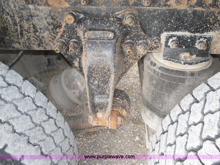 image for item F7111 2000 Freightliner FLD120SD tri axle dump truck