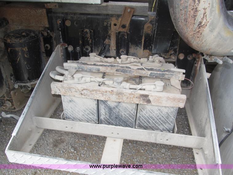 image for item F7111 2000 Freightliner FLD120SD tri axle dump truck