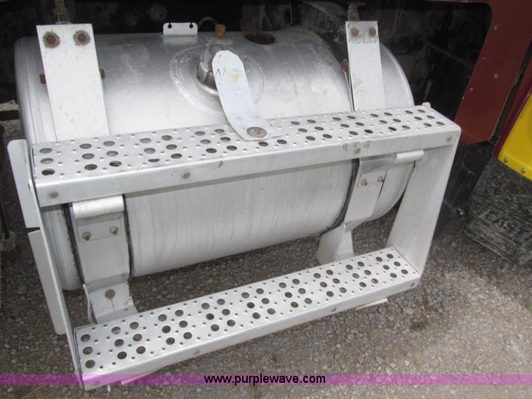 image for item F7111 2000 Freightliner FLD120SD tri axle dump truck