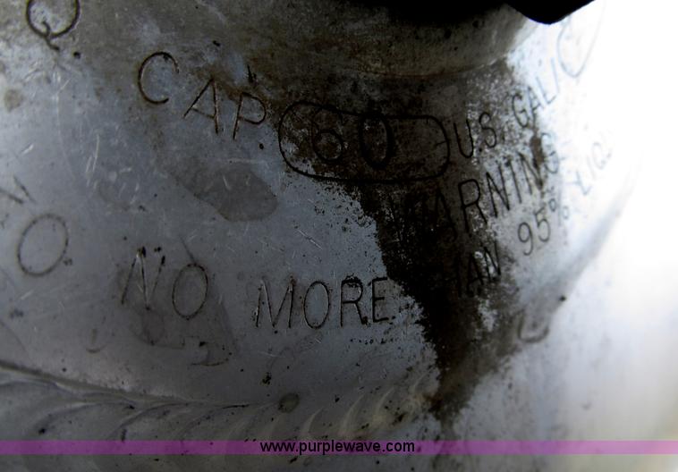 image for item F7111 2000 Freightliner FLD120SD tri axle dump truck