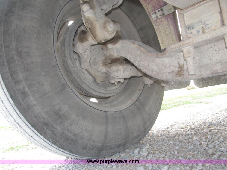 image for item F7111 2000 Freightliner FLD120SD tri axle dump truck