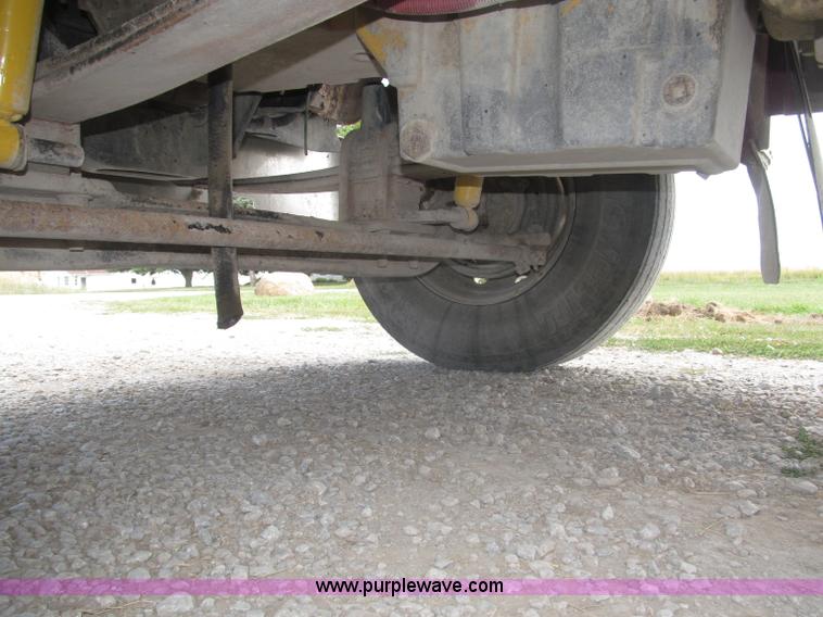 image for item F7111 2000 Freightliner FLD120SD tri axle dump truck