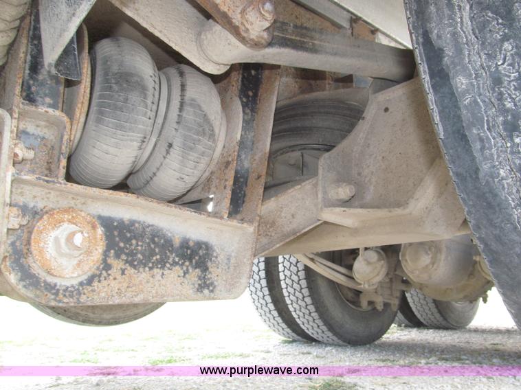 image for item F7111 2000 Freightliner FLD120SD tri axle dump truck