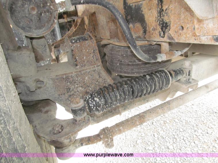 image for item F7111 2000 Freightliner FLD120SD tri axle dump truck