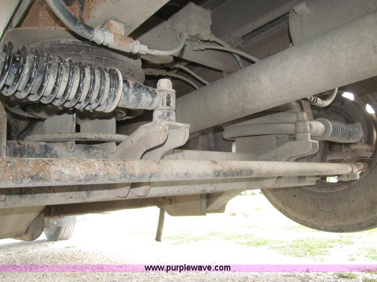 image for item F7111 2000 Freightliner FLD120SD tri axle dump truck