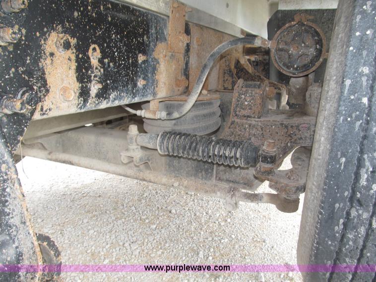 image for item F7111 2000 Freightliner FLD120SD tri axle dump truck