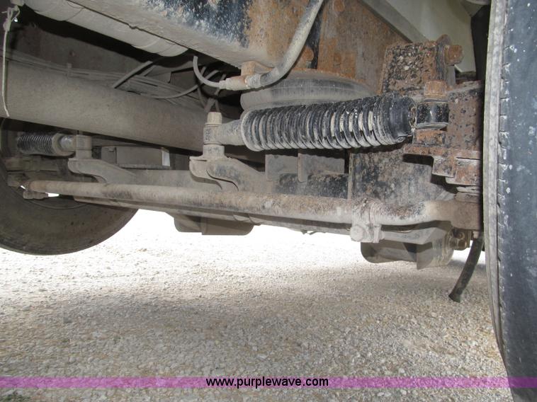 image for item F7111 2000 Freightliner FLD120SD tri axle dump truck