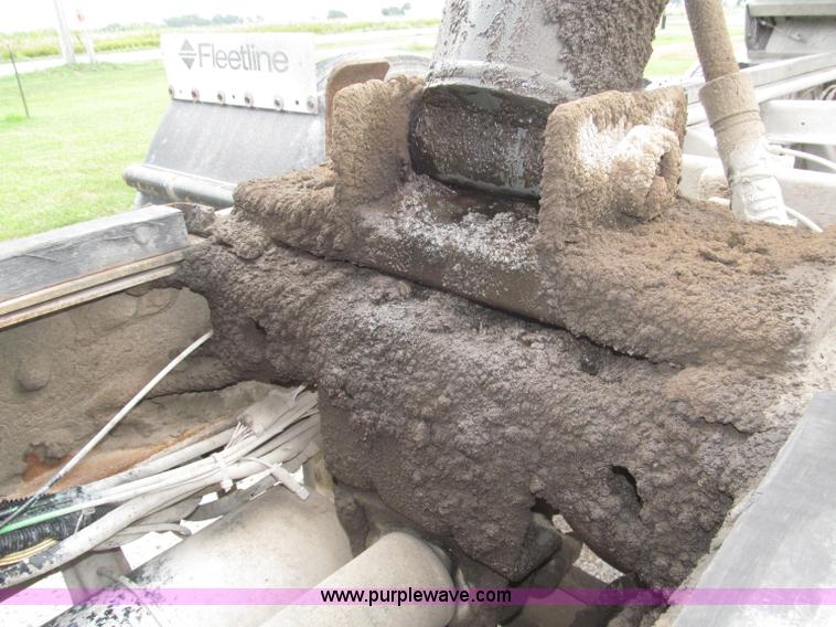 image for item F7111 2000 Freightliner FLD120SD tri axle dump truck