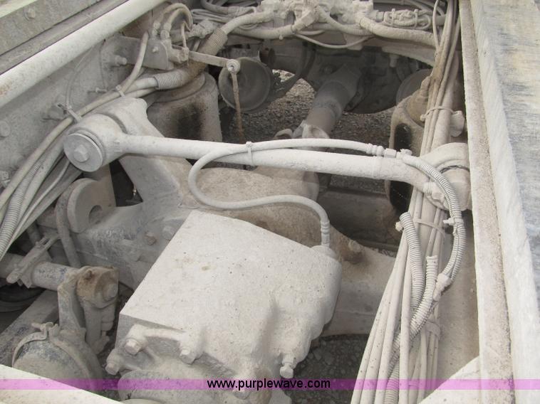 image for item F7111 2000 Freightliner FLD120SD tri axle dump truck