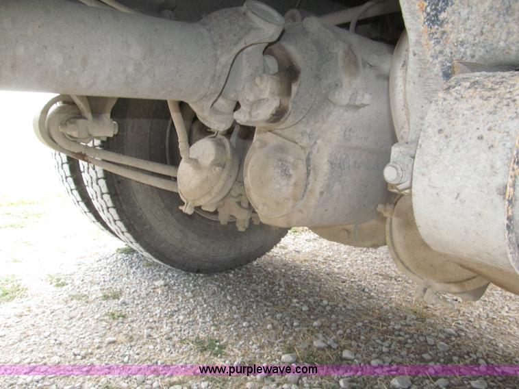 image for item F7111 2000 Freightliner FLD120SD tri axle dump truck